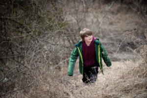 Boy Exploring Nashville Conservation Reserve in Caledon